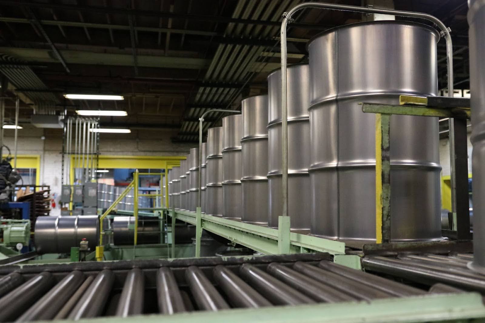 Steel drums on a manufacturing line at North Coast Container, designed for cold-weather performance