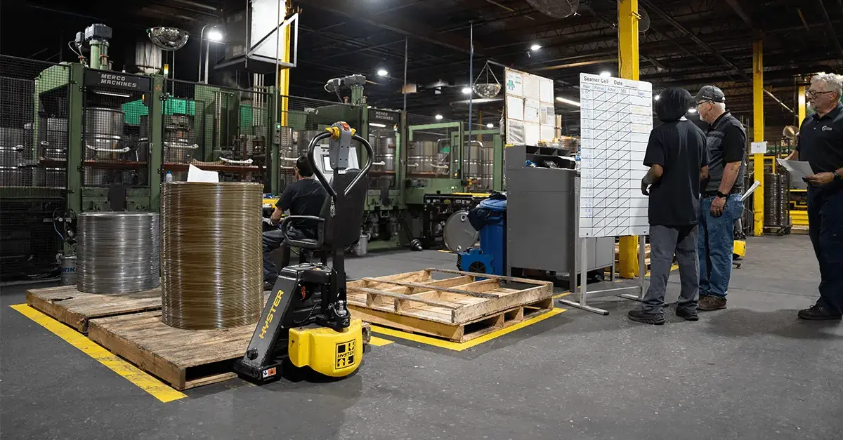 NCC team members working at the manufacturing facility