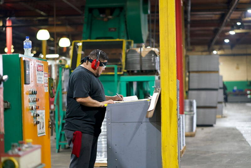 North Coast Container employee providing customer service at NCC’s steel drum manufacturing facility